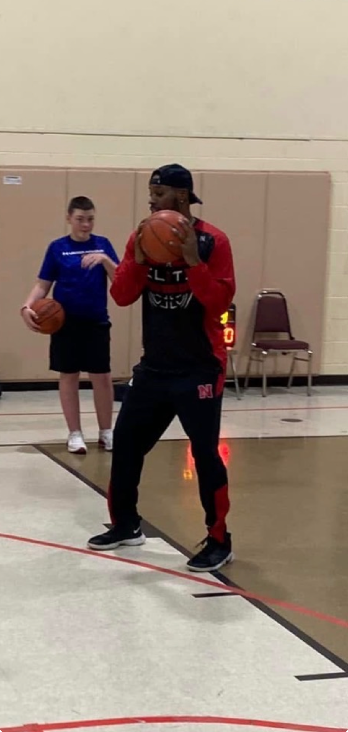 Coach Vinny demonstrating basketball technique